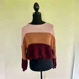 Debut women’s cropped knit sweater. Size medium. Light pink, brown and maroon.